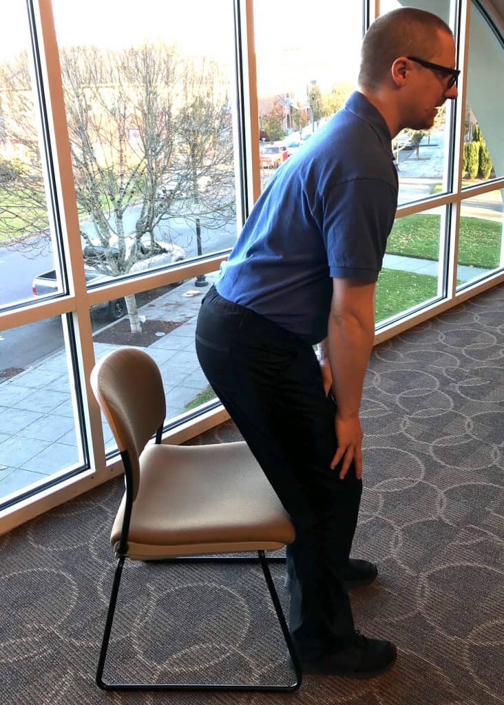 Place back of legs next to seat
